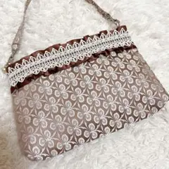 美品☆近沢レース店 ハンドポーチ ミニバッグ マルチケース 総刺繍 リボンフリル