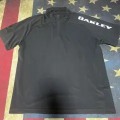 OAKLEY ブラック ハーフジップシャツ