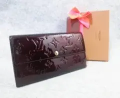 ルイヴィトン 長財布 ヴェルニ ポルトフォーユ サラ ダークパープル