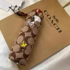 新品 未使用 コーチ スヌーピー コラボ 折りたたみ傘 カーキ シグネチャー