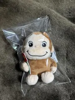 おさるのジョージ ぽってりマスコット ぽかぽか陽気におでかけ
