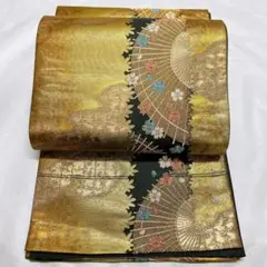 金色地に傘が織られた袋帯 着物