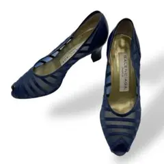 BALENCIAGA lace and leather pumps