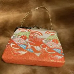 オレンジの花柄刺繍バッグ