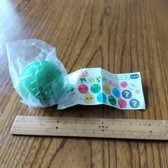 カラフル顔のカプセルトイ 緑
