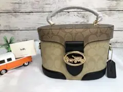 COACH✩ショルダーバッグ ベージュ オーバル シグネチャー