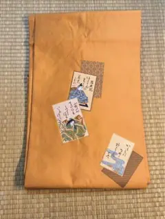 名古屋帯　かるた柄　オレンジ色