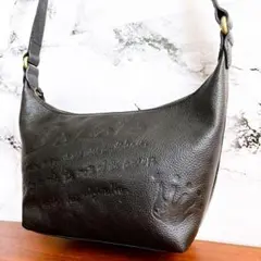 未使用級 ダコタ ショルダーバッグ ロゴエンボス 型押し レザー ブラック
