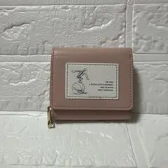 おさるのジョージ　　　ピンク 三つ折り財布 イラスト付き