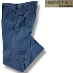 J7304美品 インコテックススラックス 1プリーツガーメントダイパンツ 紺31