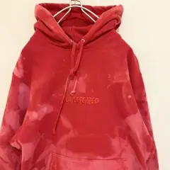 カナダ製 UNDEFEATED センター刺繍ロゴ タイダイ レッドパーカー