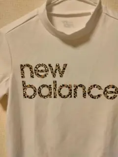 new balance ヒョウ柄ロゴシャツ