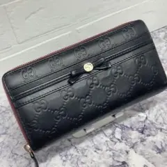 70 美品 GUCCI グッチ リボン ラウンドファスナー 長財布 レザー