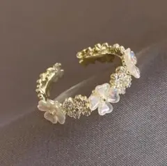 1180 新品　フラワーリング☆指輪　フリーサイズ★金　花デザイン