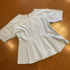 ライトブルー 半袖 ぺプラムフレアシルエット トップス Mサイズ