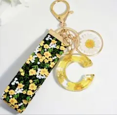 花柄リボン付きイエローチャーム　わけあり