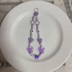 紫の蝶とハートのストラップ