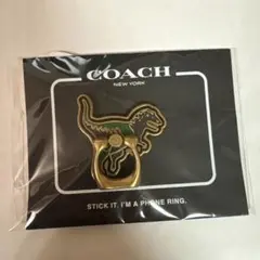 COACH 恐竜モチーフ レキシー　スマホリング　フォーングリップ
