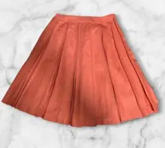 オレンジ プリーツスカート