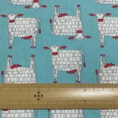 セール品　moda　モダ　牛さん柄　水色地　生地　はぎれ