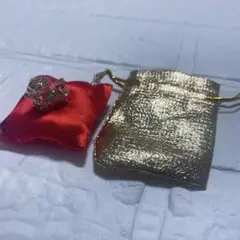 龍の置物 赤座布団と金の袋付き