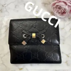 GUCCI グッチ 二つ折り財布 GG シマ リボン ブラック