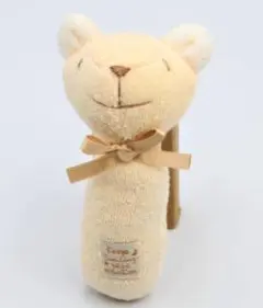 クリーム色 猫型ぬいぐるみ