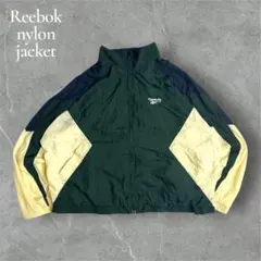 リーボックReebokナイロンウォームアップジャケット切替デザイン 短丈太アーム