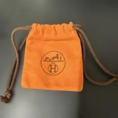HERMES オレンジ 布製ポーチ ロゴ入り