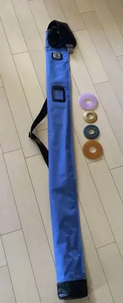 青い竹刀袋と4つのリング