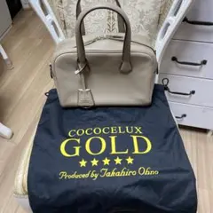 COCOCELUX GOLD ベージュ レザー ハンドバッグ