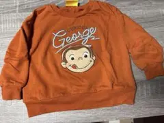 Curious George トレーナー オレンジ
