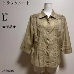 【訳あり】トランクルート シアーブラウス 五分袖 光沢 肩パット透け感 L
