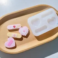 #0026シリコンモールド　デコパーツ　絆創膏　ナース　トレカ レンジ