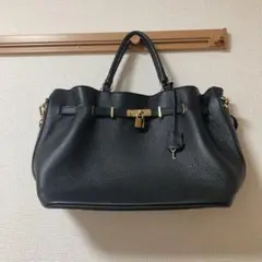 【ひよ】値下げ　MILOS カナグツキトート黒 MILOS】定価20900円‼︎ カナグツキトート 黒 - メルカリ