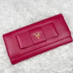 PRADA 長財布 リボン フラップ サフィアーノ ピンクレザー ゴールドロゴ