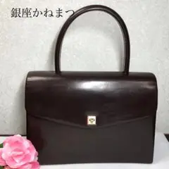 銀座かねまつ バンドバッグ ブラウン ターンロック 金具