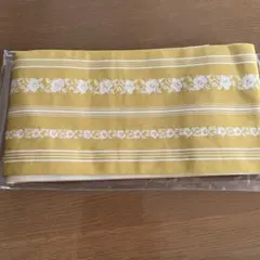 新品リバーシブルの半腹帯を格安で、からし色に白の花柄、裏はべージュが粋です。