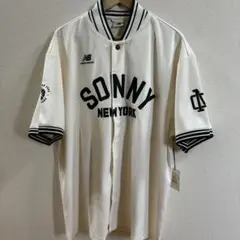 エメレオンドレ×ニューバランス ウォームアップシャツ