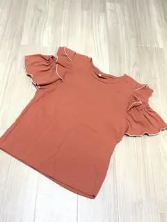 GU フリル袖オレンジリブトップス 140
