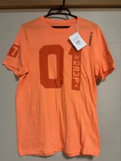 Reebok オレンジ Tシャツ AQE86