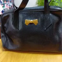 リボン装飾の黒いハンドバッグヨーロッパの本店で買っニナリッチバッグ