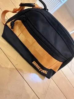 BRIEFING ブラック オレンジ ポーチ