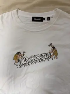 XLARGE 原始人プリント Tシャツ ホワイト