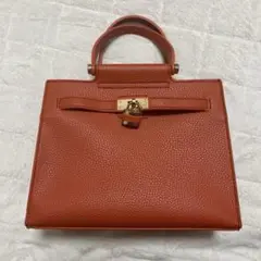 新品未使用 レザーハンドバッグ ショルダー オレンジ 高見え ラグジュアリー