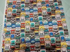 カラフルな電車とバスのプリント生地