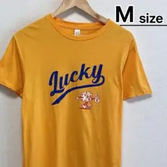 USA古着　Tシャツ　M　イエロー　マスタード　ロゴ　キャラクター　Lucky