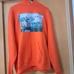 Champion オレンジ グラフィックパーカー Lサイズ