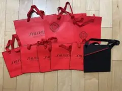 資生堂 SHISEIDO ショッパー 紙袋 赤 黒