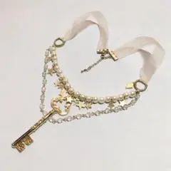 メタモルフォーゼ　スターオーガンジーネックレス　鍵　星　ゴールド×アイボリー